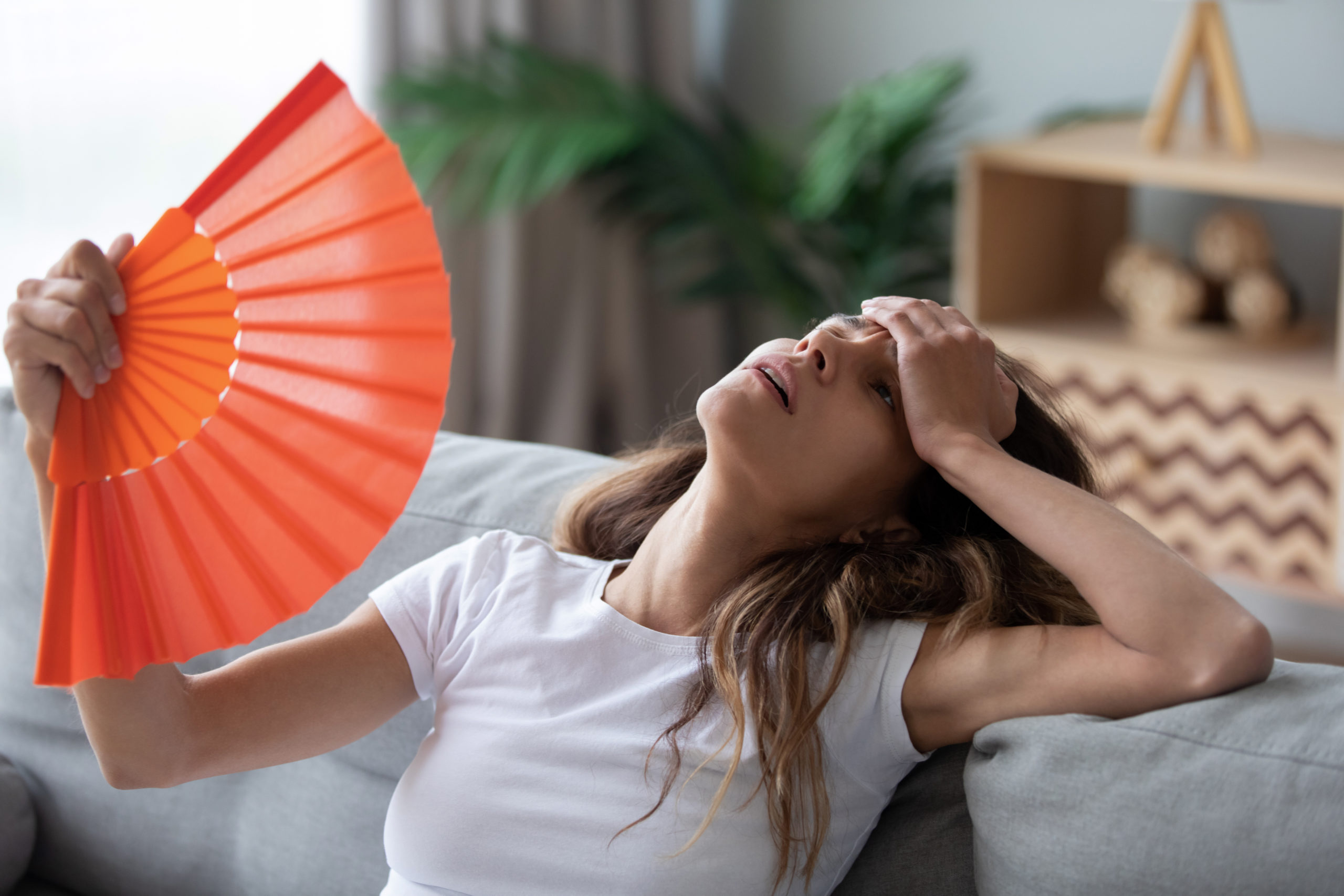 woman staying cool in summer